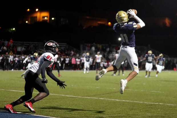 Cornerback jumps route and intercepts a pass.