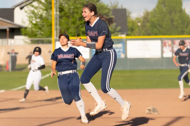 Mt. Spokane (Wash.) pitcher Addison Jay celebrates winning the WIAA 3A District 8 softball championship after striking out University’s Maliyah Mann looking, which capped the Titans' undefeated season. 