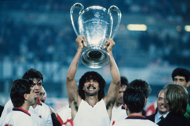 Ruud Gullit hoisting aloft the European Cup.