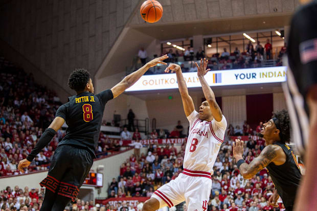 Indiana's Bryson Tucker (8) shoots over USC's Kevin Patton Jr.