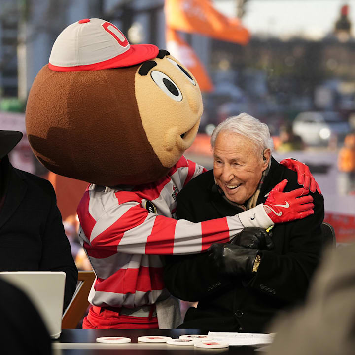 Ohio State mascot Brutus interacts with Lee Corso on the set of ESPN College GameDay prior to the College Football Playoff 