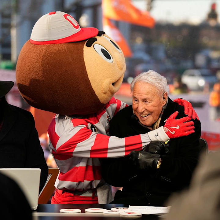 Ohio State mascot Brutus interacts with Lee Corso on the set of ESPN College GameDay prior to the College Football Playoff 