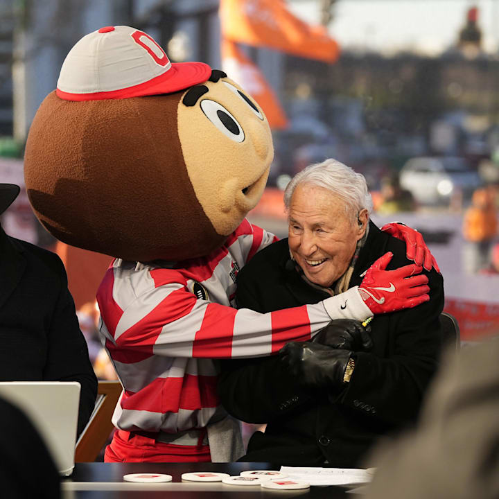 Ohio State mascot Brutus interacts with Lee Corso on the set of ESPN College GameDay prior to the College Football Playoff 