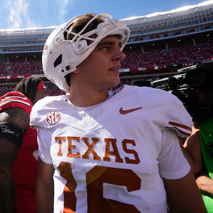 Texas Longhorns quarterback Arch Manning leaves the field following the game against the Ohio State Buckeyes 