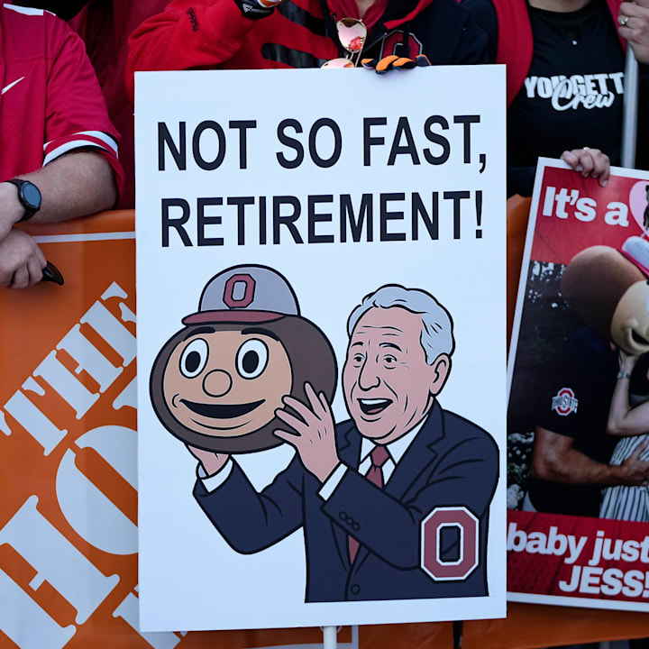 Fans hold signs in support of Lee Corso on the set of ESPN College GameDay prior to the NCAA football game between the Ohio S