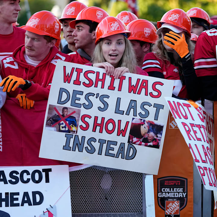 Fans hold signs in support of Lee Corso on the set of ESPN College GameDay prior to the NCAA football game between the Ohio S