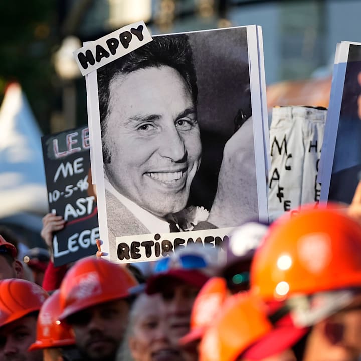 Fans hold signs in support of Lee Corso on the set of ESPN College GameDay prior to the NCAA football game between the Ohio S