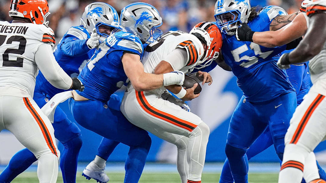 Detroit Lions defensive end Aidan Hutchinson (97) sacked Cleveland Browns quarterback Joe Flacco (15) during the first half at Ford Field in Detroit on Sunday, Sept. 28, 2025.