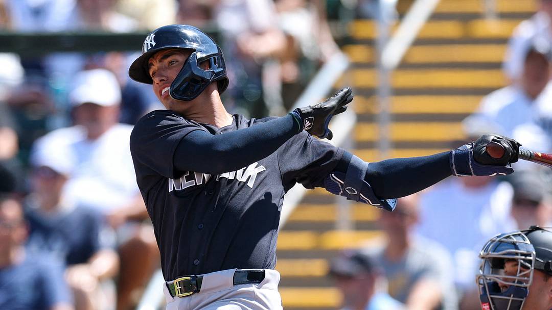 Feb 27, 2026; Fort Myers, Florida, USA; New York Yankees shortstop George Lombard Jr. (96) hits a two-rbi single against the Minnesota Twins in the first inning during spring training at Lee Health Sports Complex/Hammond Stadium. Mandatory Credit: Nathan Ray Seebeck-Imagn Images Feb 27, 2026; Fort Myers, Florida, USA; New York Yankees shortstop George Lombard Jr. (96) hits a two-rbi single against the Minnesota Twins in the first inning during spring training at Lee Health Sports Complex/Hammond Stadium. Mandatory Credit: Nathan Ray Seebeck-Imagn Images