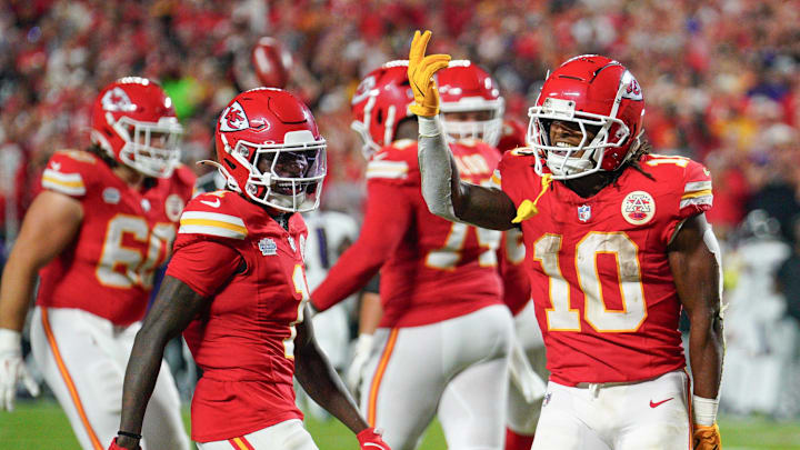 Sep 5, 2024; Kansas City, Missouri, USA; Kansas City Chiefs running back Isiah Pacheco (10) celebrates with wide receiver Xavier Worthy (1) after scoring against the Baltimore Ravens during the game at GEHA Field at Arrowhead Stadium. Mandatory Credit: Denny Medley-Imagn Images