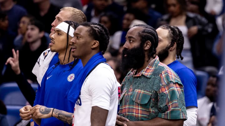 Mar 15, 2024; New Orleans, Louisiana, USA;  LA Clippers guard James Harden (1) watches the final minute from the bench against the New Orleans Pelicans during the second half at Smoothie King Center. Mandatory Credit: Stephen Lew-USA TODAY Sports
