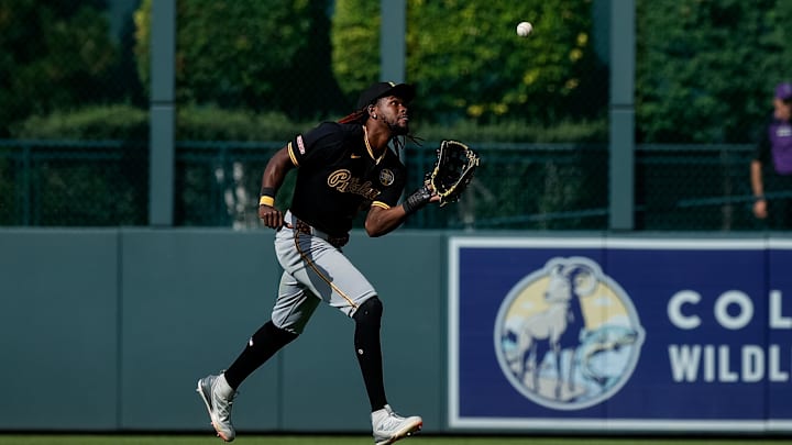 Aug 2, 2025; Denver, Colorado, USA; Pittsburgh Pirates center fielder Oneil Cruz (15) makes a catch for an out in the eighth inning against the Colorado Rockies at Coors Field. Mandatory Credit: Isaiah J. Downing-Imagn Images
