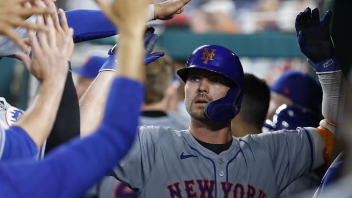 Jun 4, 2024; Washington, District of Columbia, USA; New York Mets first base Pete Alonso (20) celebrates with teammates in the dugout after hitting a home run against the Washington Nationals during the ninth inning at Nationals Park. Mandatory Credit: Geoff Burke-USA TODAY Sports