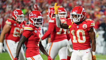 Sep 5, 2024; Kansas City, Missouri, USA; Kansas City Chiefs running back Isiah Pacheco (10) celebrates with wide receiver Xavier Worthy (1) after scoring against the Baltimore Ravens during the game at GEHA Field at Arrowhead Stadium. Mandatory Credit: Denny Medley-Imagn Images