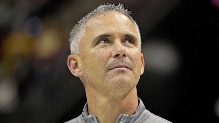 Mar 9, 2024; Tallahassee, Florida, USA; Florida State Seminoles head football coach Mike Norvell accepts the Bear Bryant coach of the Year award during a media timeout of a basketball game against the Miami Hurricanes at Donald L. Tucker Center. Mandatory Credit: Melina Myers-Imagn Images