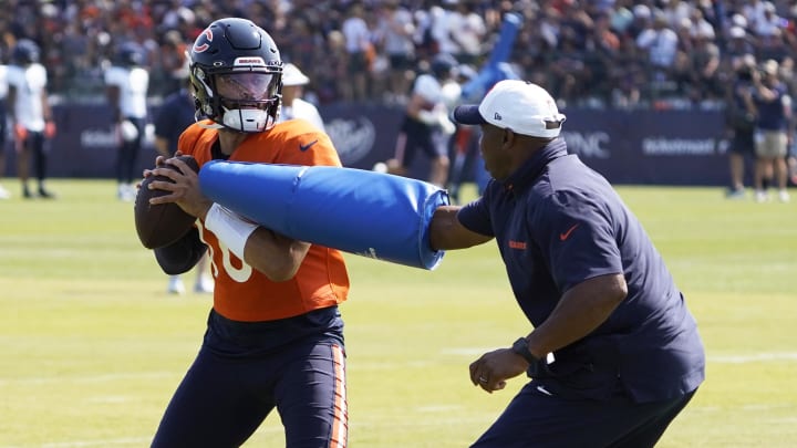 Caleb Williams goes through passing drills at Halas Hall in training camp.