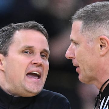 Mar 22, 2025; Providence, RI, USA; McNeese State Cowboys head coach Will Wade talks to an official during the second half of a second round men’s NCAA Tournament game against the Purdue Boilermakers at Amica Mutual Pavilion. Mandatory Credit: Brian Fluharty-Imagn Images