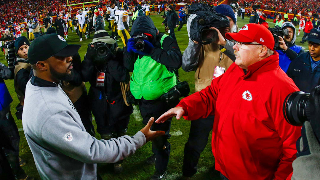 Jan 15, 2017; Kansas City, MO, USA; Pittsburgh Steelers head coach Mike Tomlin shakes hands with Kansas City Chiefs head coach Andy Reid following the AFC Divisional playoff game at Arrowhead Stadium. The Steelers won 18-16. Mandatory Credit: Jay Biggerstaff-Imagn Images