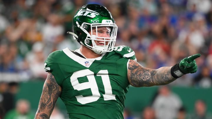 Aug 24, 2024; East Rutherford, New Jersey, USA; New York Jets defensive end Braiden McGregor (91) gestures to the sidelines against the New York Giants during the first half at MetLife Stadium. 