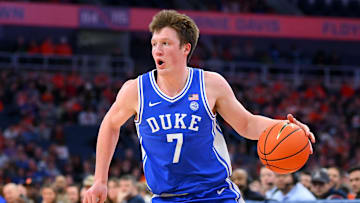 Feb 5, 2025; Syracuse, New York, USA; Duke Blue Devils guard Kon Knueppel (7) drives against the Syracuse Orange during the first half at the JMA Wireless Dome. Mandatory Credit: Rich Barnes-Imagn Images