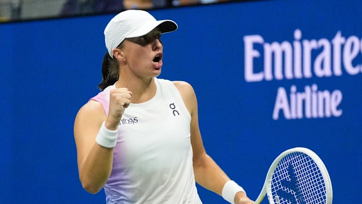 Aug 31, 2024; Flushing, NY, USA;  Iga Swiatek (POL) reacts after beating Anastasia Pavlyuchenkova on day six of the 2024 U.S. Open tennis tournament at USTA Billie Jean King National Tennis Center. Mandatory Credit: Robert Deutsch-Imagn Images