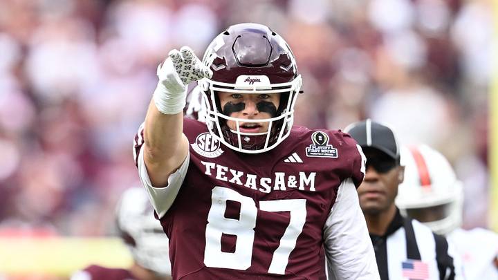 Dec 20, 2025; College Station, TX, USA; Texas A&M Aggies tight end Nate Boerkircher (87) celebrates a first down against the Miami Hurricanes during first quarter of the first round game of the CFP National Playoff at Kyle Field. 