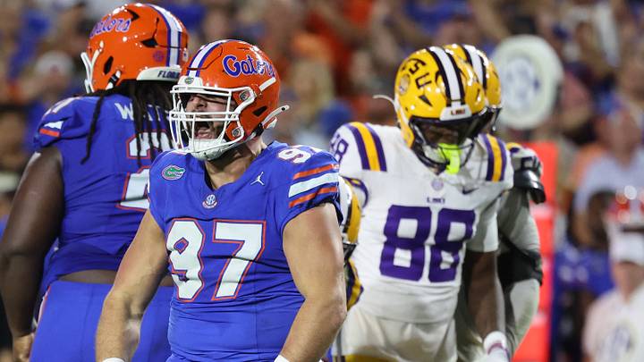 Nov 16, 2024; Gainesville, Florida, USA; Florida Gators defensive lineman Joey Slackman (97) celebrates after they sacks LSU Tigers quarterback Garrett Nussmeier (13) during the second half at Ben Hill Griffin Stadium. Mandatory Credit: Kim Klement Neitzel-Imagn Images
