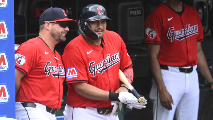 Jun 23, 2024; Cleveland, Ohio, USA; Cleveland Guardians manager Stephen Vogt (12) talks to first baseman Josh Naylor (22) in the second inning against the Toronto Blue Jays at Progressive Field. Mandatory Credit: David Richard-USA TODAY Sports