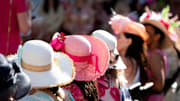 Women wait to compete in the hat contest Saturday at Kentucky Derby on Worth.