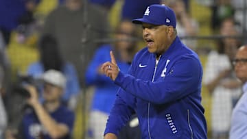 Jun 19, 2025; Los Angeles, California, USA;   Los Angeles Dodgers manager Dave Roberts (30) yells at San Diego Padres manager Mike Shildt (8) after benches cleared in the eighth inning at Dodger Stadium. Mandatory Credit: Jayne Kamin-Oncea-Imagn Images