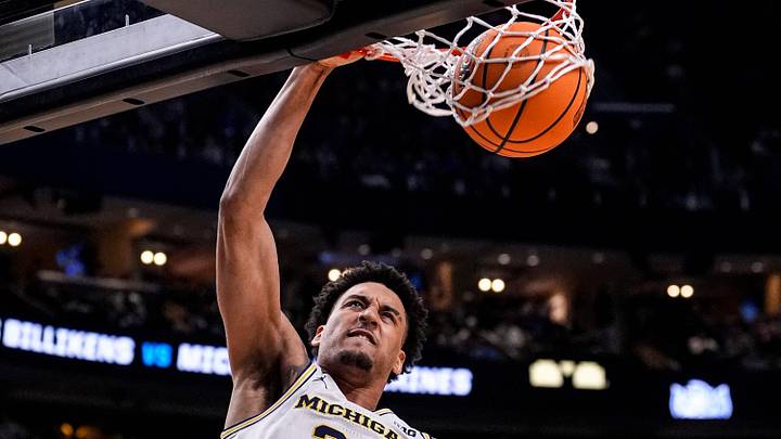 Michigan forward Yaxel Lendeborg (23) dunks against Saint Louis during the second half of NCAA Tournament Second Round at KeyBank Center in Buffalo on Saturday, March 21, 2026.