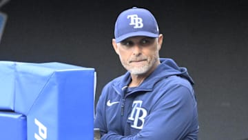 Aug 26, 2025; Cleveland, Ohio, USA; Tampa Bay Rays manager Kevin Cash (16) stands in the dugout in the first inning against the Cleveland Guardians at Progressive Field. 