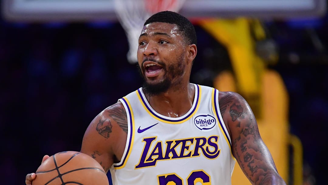 Dec 25, 2025; Los Angeles, California, USA; Los Angeles Lakers guard Marcus Smart (36) moves the ball up court against the Houston Rockets during the first half at Crypto.com Arena. Mandatory Credit: Gary A. Vasquez-Imagn Images