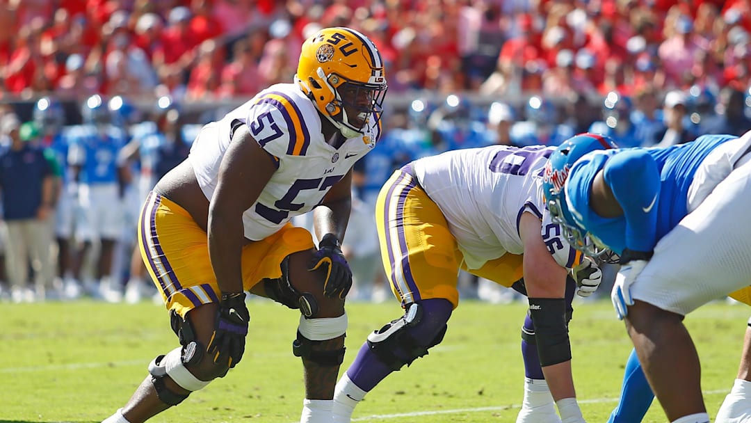 LSU Tigers offensive lineman Carius Curne (57) waits for the snap during the first quarter against the Mississippi Rebels at Vaught-Hemingway Stadium. 