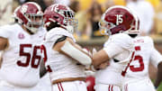 Oct 11, 2025; Columbia, Missouri, USA;  Alabama Crimson Tide quarterback Ty Simpson (15) and offensive lineman Parker Brailsford (72) celebrate against the Missouri Tigers during the first half at Faurot Field at Memorial Stadium.