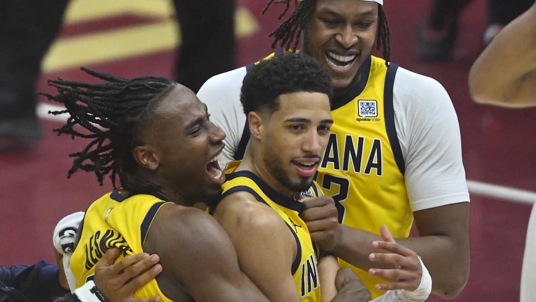 Tyrese Haliburton celebrates with Aaron Nesmith (left) and Myles Turner after making the game-winning 3-pointer against Cleveland.