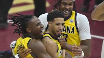 Tyrese Haliburton celebrates with Aaron Nesmith (left) and Myles Turner after making the game-winning 3-pointer against Cleveland.