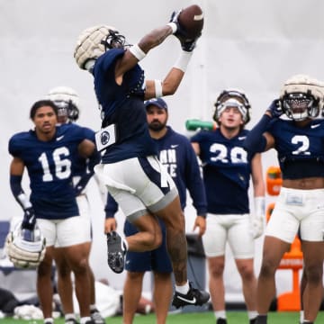 Penn State cornerback A.J. Harris catches a pass during a practice session inside Holuba Hall. 