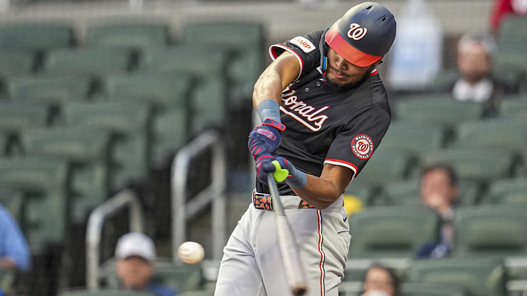 Sep 23, 2025; Cumberland, Georgia, USA; Washington Nationals left fielder James Wood (29) hits a double against the Atlanta Braves during the first inning at Truist Park. 