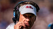 Ole Miss head coach Lane Kiffin walks off the field during a college football game between Mississippi State and Ole Miss at Davis Wade Stadium in Starkville, Miss., on Friday, Nov. 28, 2025. The Egg Bowl game marks the 122nd meeting between the two teams.