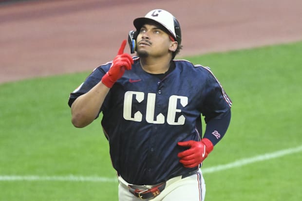 Josh Naylor celebrates a solo home run 