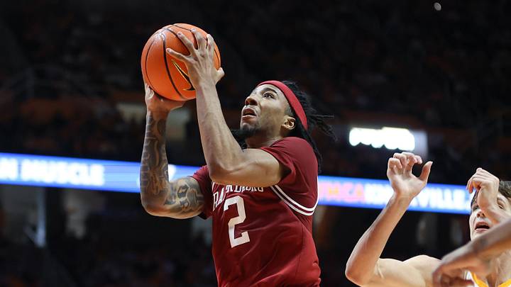 Jan 4, 2025; Knoxville, Tennessee, USA; Arkansas Razorbacks guard Boogie Fland (2) goes to the basket against the Tennessee Volunteers during the second half at Thompson-Boling Arena at Food City Center. Mandatory Credit: Randy Sartin-Imagn Images