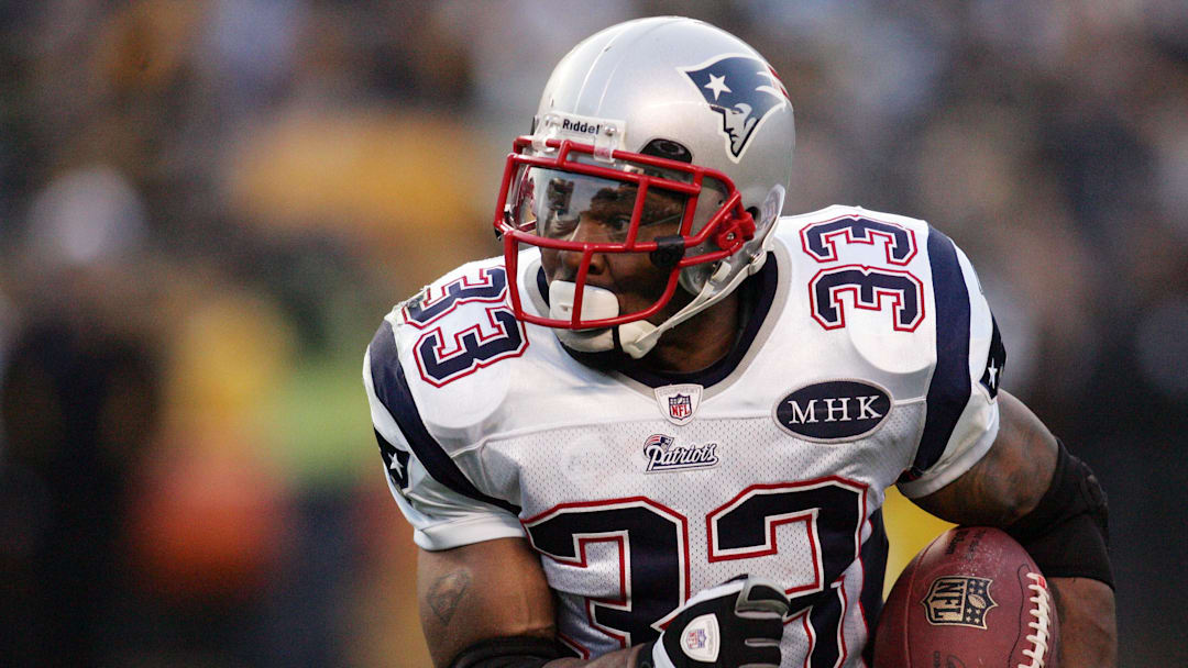 October 30, 2011; Pittsburgh,PA, USA: New England Patriots running back Kevin Faulk (33) carries the ball against the Pittsburgh Steelers during the second quarter at Heinz Field. The Steelers won 25-17. Mandatory Credit: Charles LeClaire-USPRESSWIRE