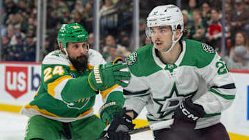 Nov 16, 2024; Saint Paul, Minnesota, USA; Minnesota Wild defenseman Zach Bogosian (24) checks Dallas Stars center Mavrik Bourque (22) in the third period at Xcel Energy Center. Mandatory Credit: Matt Blewett-Imagn Images
