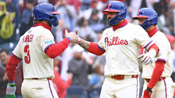 Philadelphia Phillies outfielder Nick Castellanos (8) celebrates his grand slam with first base Bryce Harper (3) during the third inning against the Los Angeles Dodgers home run at Citizens Bank Park.