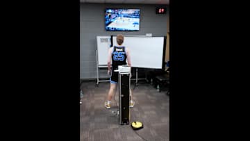 BYU's Dawson Baker paces around the locker room on March 22, 2025.