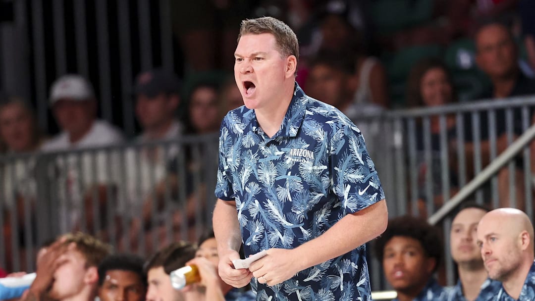 Nov 29, 2024; Paradise Island, Bahamas, BHS;  Arizona Wildcats head coach Tommy Lloyd reacts against the West Virginia Mountaineers during the first half at Imperial Arena at the Atlantis resort.
