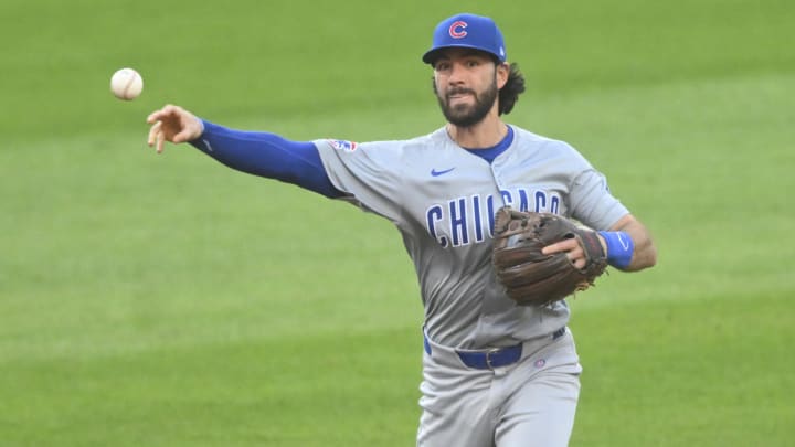 Aug 13, 2024; Cleveland, Ohio, USA; Chicago Cubs shortstop Dansby Swanson (7) throws to first base in the third inning against the Cleveland Guardians at Progressive Field.