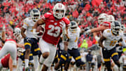 Wisconsin star running back Jonathan Taylor is powerful