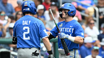Jun 19, 2024; Omaha, NE, USA;  Kentucky Wildcats second baseman …milien Pitre (4) celebrates a home run with third baseman Mitchell Daly (2) against the Florida Gators during the fifth inning at Charles Schwab Field Omaha. Mandatory Credit: Steven Branscombe-Imagn Images